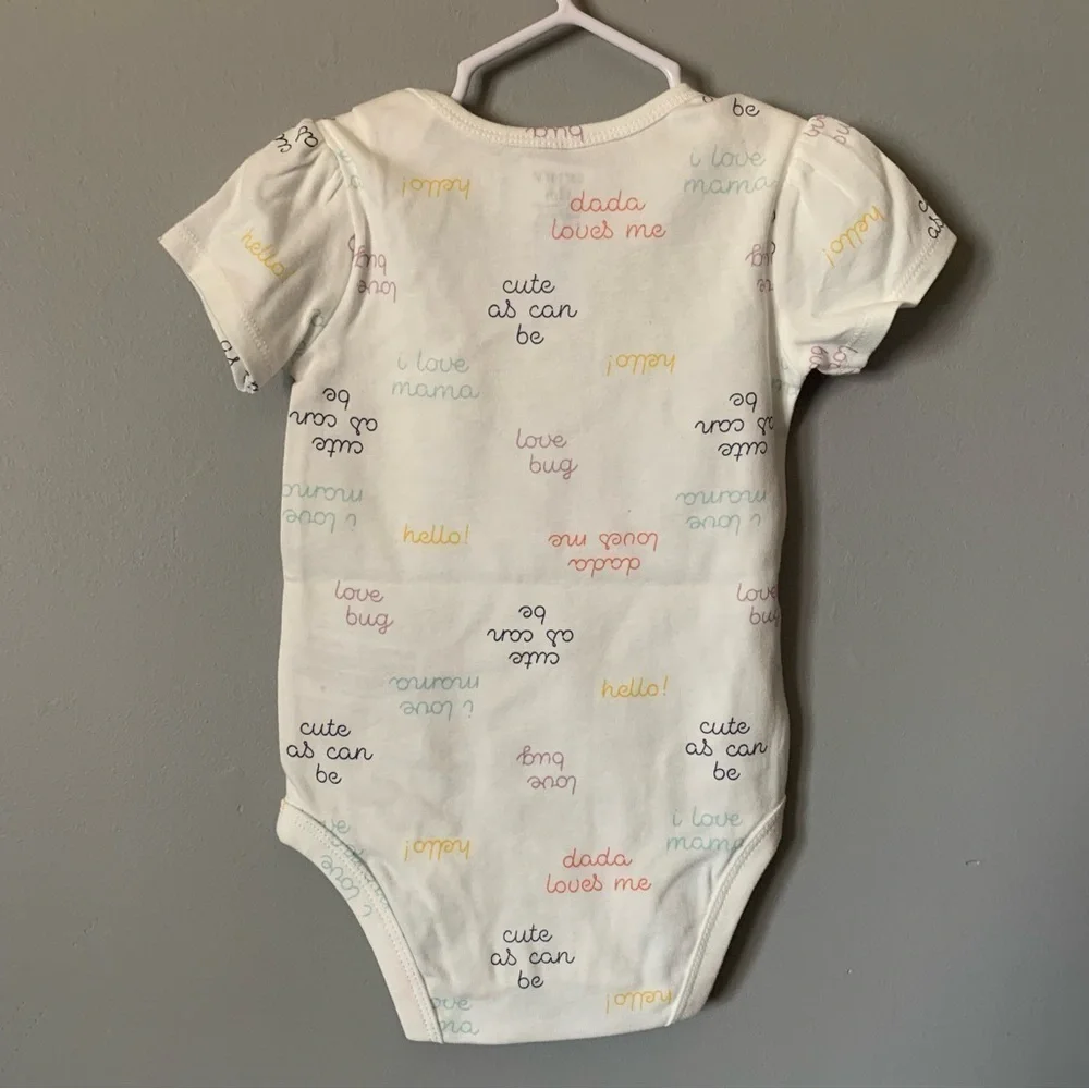 NWT. CARTER’S White Baby Onesie with Colorful Text